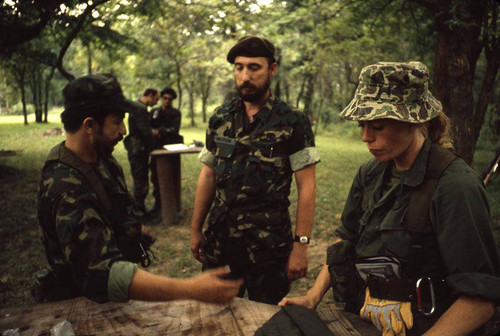 Survival school students learn first aid techniques, Liberal, 1982