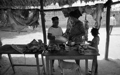 Women selling and buying meat, San Basilio de Palenque, 1976