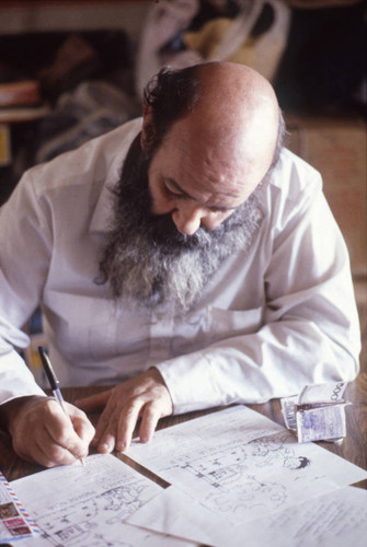 Man writes on document, Mexico City, 1982