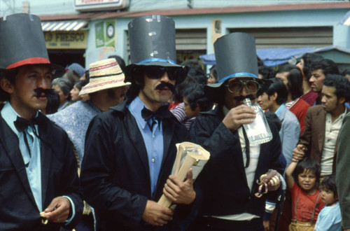 Men in costume at the Blacks and Whites Carnival, Nariño, Colombia, 1979