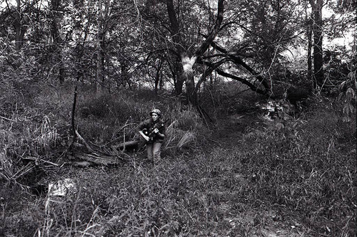 Survival school student holds a rifle, Liberal, 1982