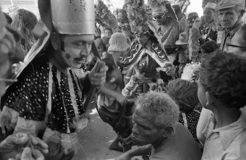 Dancers dancing among the Carnival crowd, Barranquilla, Colombia, 1977