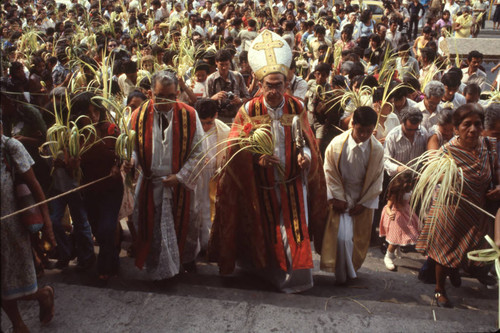 Archbishop Arturo Rivera y Damas walking up cathedral stairs, San Salvador, El Salvador, 1982