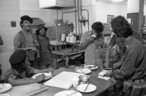 Sandinistas eat at a hotel, Managua, 1979