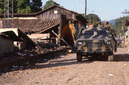 Salvadoran soldiers on patrol in vehicle, San Agustín, Usulután, 1983