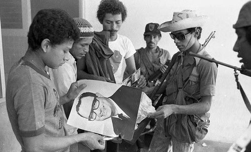 Sandinistas burning a photo of Anastasio Somoza Debayle, Leon, 1979