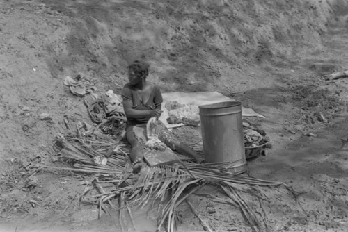 Woman washing clothes, San Basilio de Palenque, Colombia, 1977