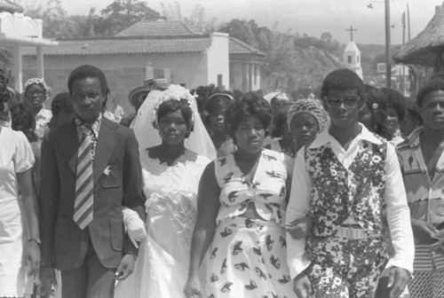 Wedding couple walking in the street, San Basilio de Palenque, 1975