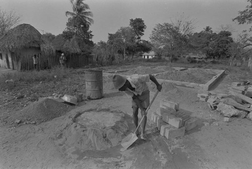 Man working at construction site, San Basilio de Palenque, ca. 1978