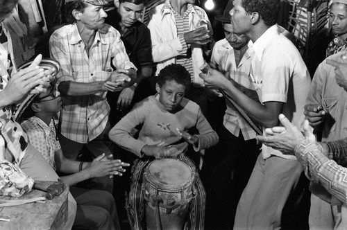 Boy playing the conga drum, Barranquilla, Colombia, 1977