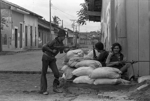 Sandinistas on a street corner, Nicaragua, 1979