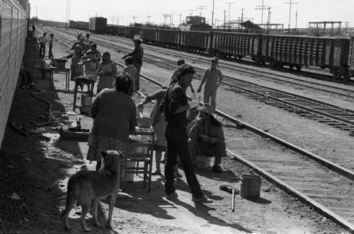 Food vendors at train stop, Mexico, 1983