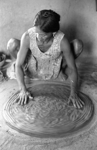 Woman making pottery, La Chamba, Colombia, 1975