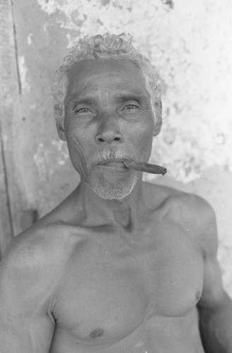 Man with cigar, San Basilio de Palenque, 1976