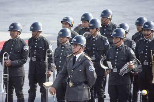 Military band standing at attention during a papal visit, San Salvador, El Salvador, 1983