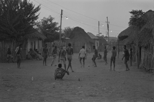 Boys playing soccer in the street, San Basilio de Palenque, ca. 1978