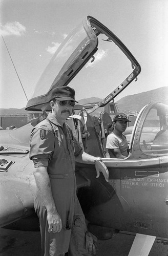 U.S. military pilot and Salvadoran cadet at Salvadoran air base, Ilopango, 1983