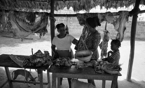 Women selling and buying meat, San Basilio de Palenque, 1976