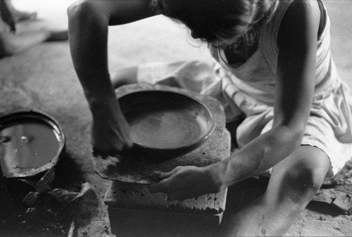 Woman making pottery, La Chamba, Colombia, 1975