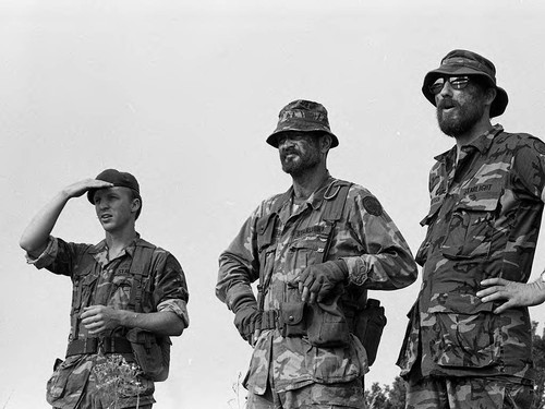 Survival school instructor and assistants, Liberal, 1982