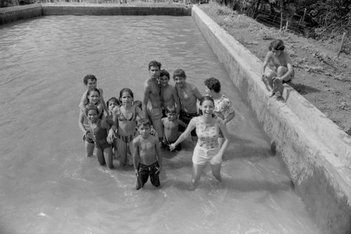 Young people in a pool, La Guajira, Colombia, 1976