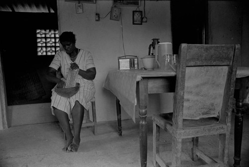 Woman grating coco, San Basilio de Palenque, 1976