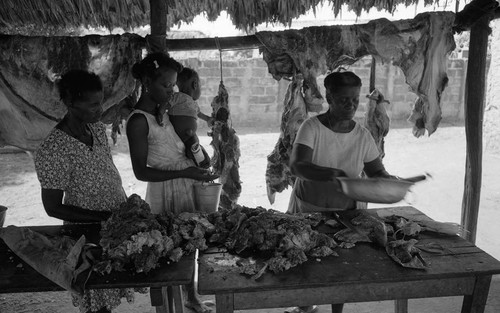 Women selling and buying meat, San Basilio de Palenque, 1976