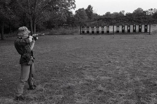 Survival school student shoots targets, Liberal, 1982