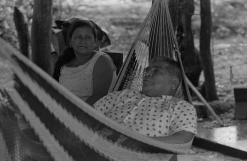 Woman and children sitting outside, La Chamba, Colombia, 1975