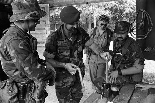 Survival school students learn about explosives, Liberal, 1982