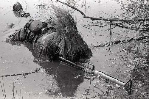 Harry Claflin demonstrates silent swim techniques, Liberal, 1982