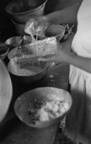 Woman using a grater, San Basilio de Palenque, 1977