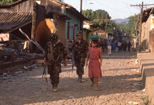 Salvadoran soldiers in reclaimed town, San Agustín, 1983