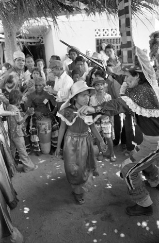 Dancing among a crowd, Barranquilla, Colombia, 1977