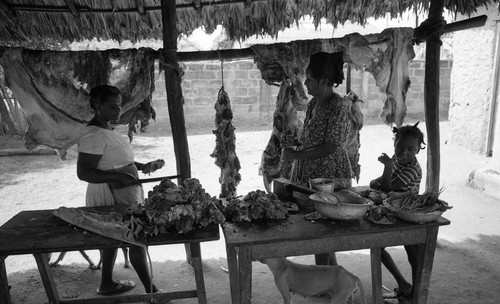 Women selling and buying meat, San Basilio de Palenque, 1976