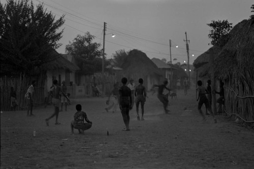 Boys playing soccer in the street, San Basilio de Palenque, ca. 1978