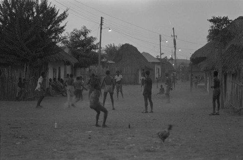 Boys playing soccer in the street, San Basilio de Palenque, ca. 1978