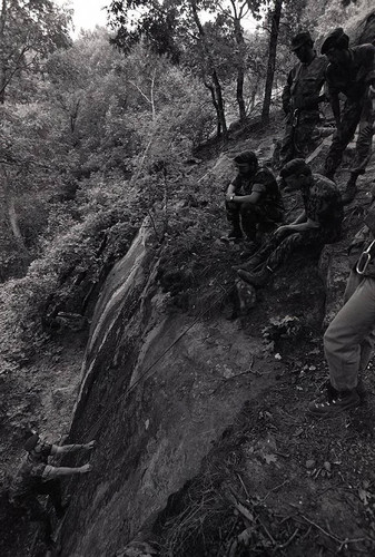 Claflin demonstrates rock climbing, Liberal, 1982