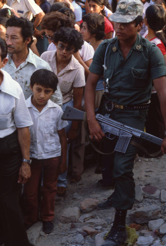 Crowd lining up at the polls to vote, Santa Tecla, El Salvador, 1982