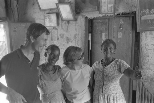 Nina S. de Friedemann, Richard Cross, and two women, San Basilio del Palenque, ca. 1978