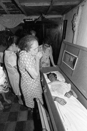 Women grieving near a coffin, Nicaragua, 1979