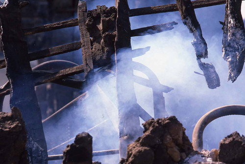 A building's smoldering remains, Berlín, Usulután, 1983