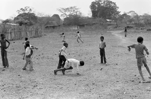 Boys playing in a dirt field, San Basilio de Palenque, 1977