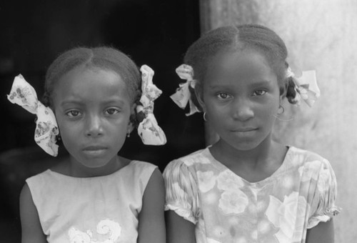 Two girls posing for a portrait, San Basilio de Palenque, 1976