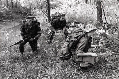 Survival school students participate in an obstacle course training, Liberal, 1982