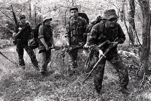 Survival school students participate in an obstacle course training, Liberal, 1982