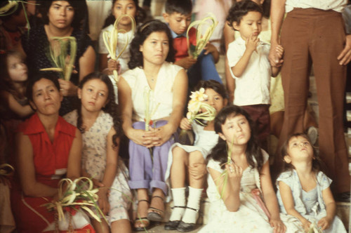 Women and children attending a memorial, San Salvador, El Salvador, 1982