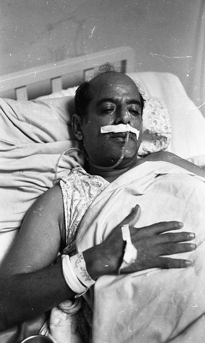 Man in hospital bed, Nicaragua, 1979