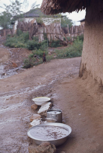 Metal containers collecting rain water, San Basilio de Palenque, 1976