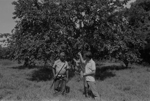 Fermín Herrera and Richard Cross posing together near the woods, San Basilio de Palenque, ca. 1978